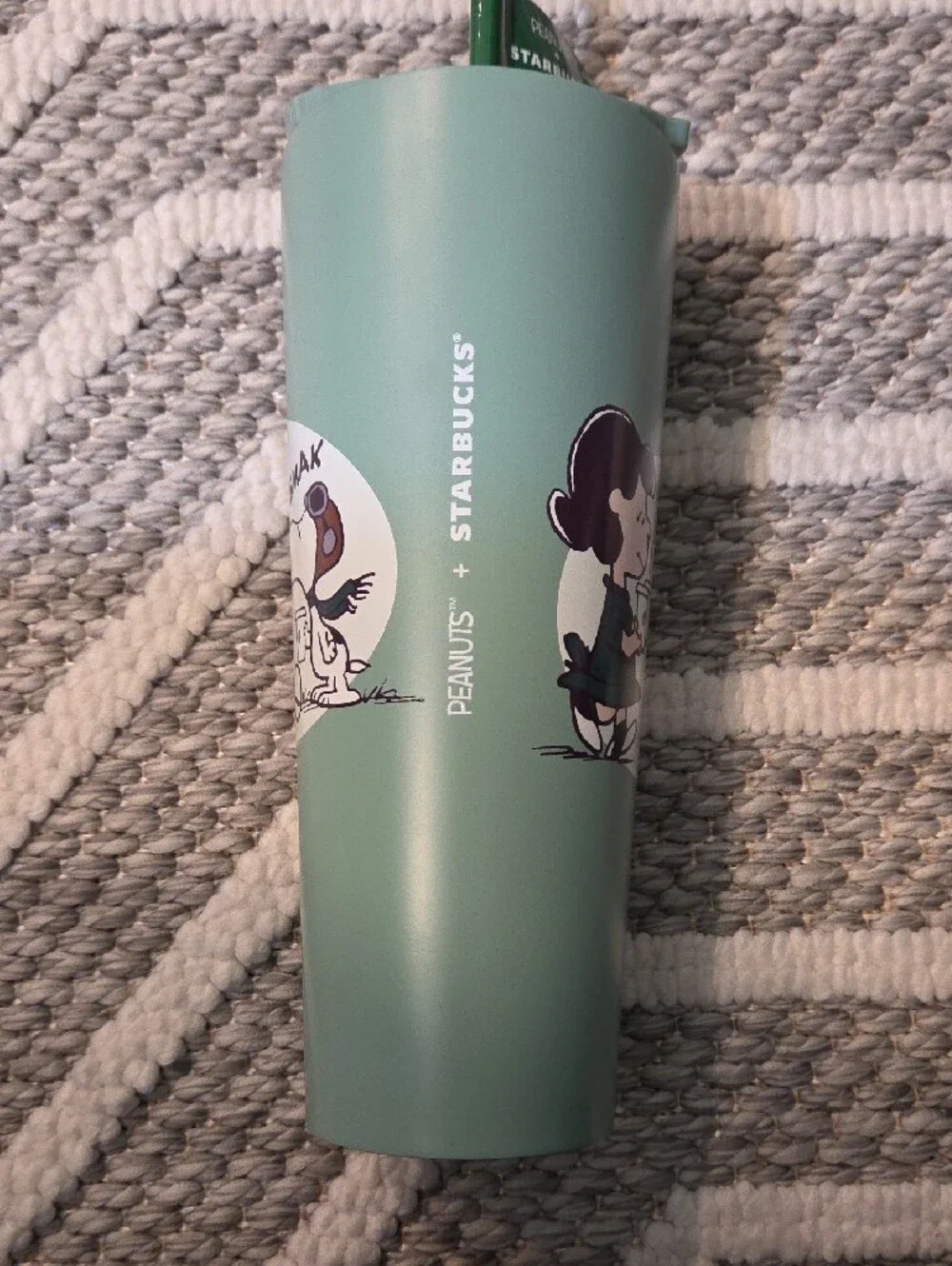 Starbucks peanuts characters featuring